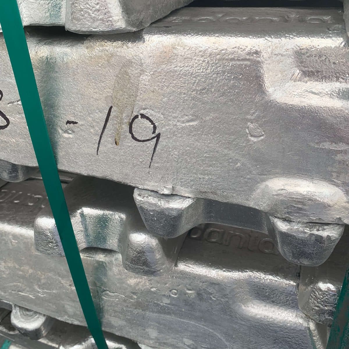Close-up of stacked aluminium ingots