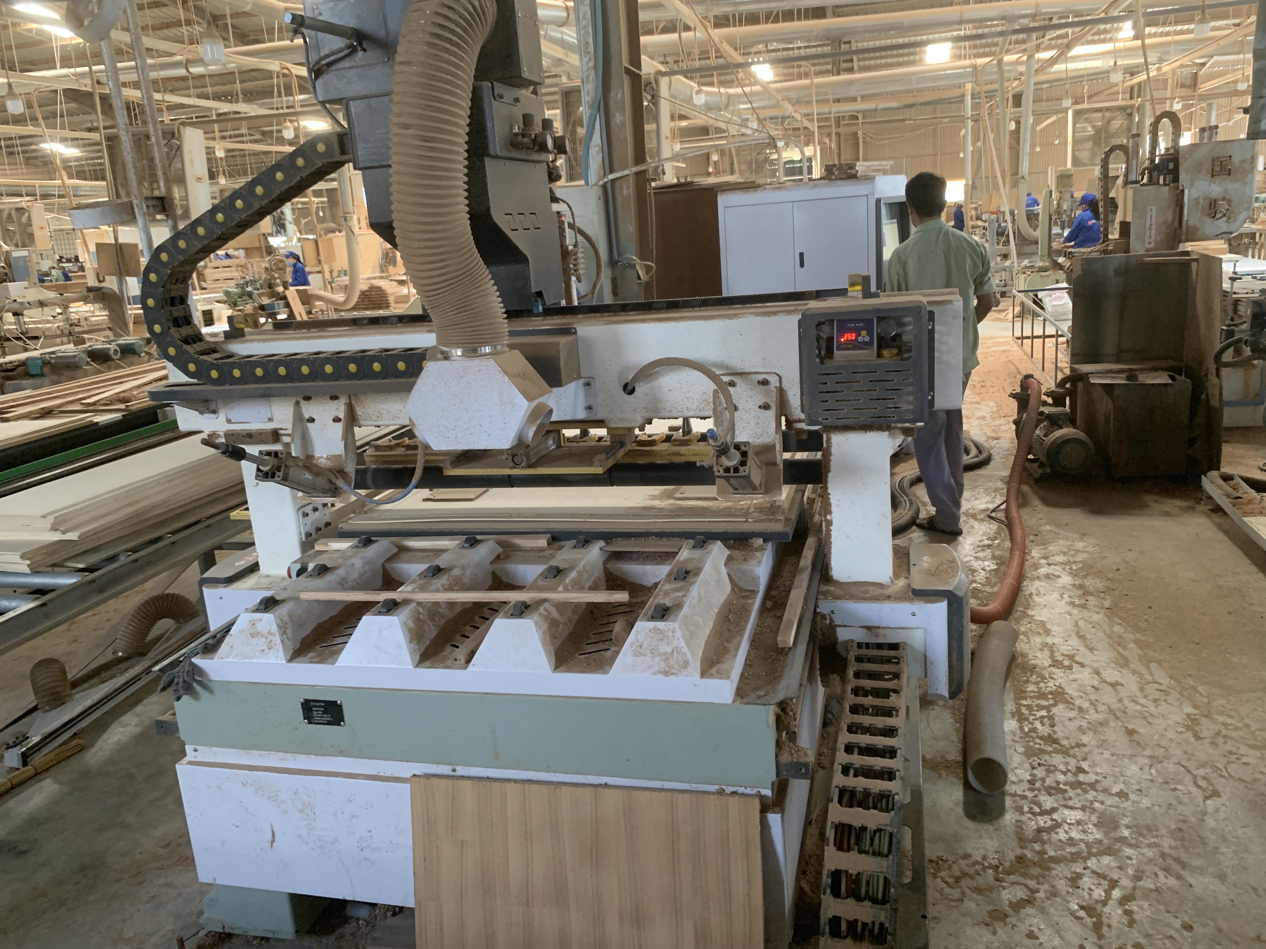 Wood manufacturing and finishing process inside a Vietnamese workshop